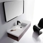 Stylish wall mounted sink vanity with black faucet and minimalist design