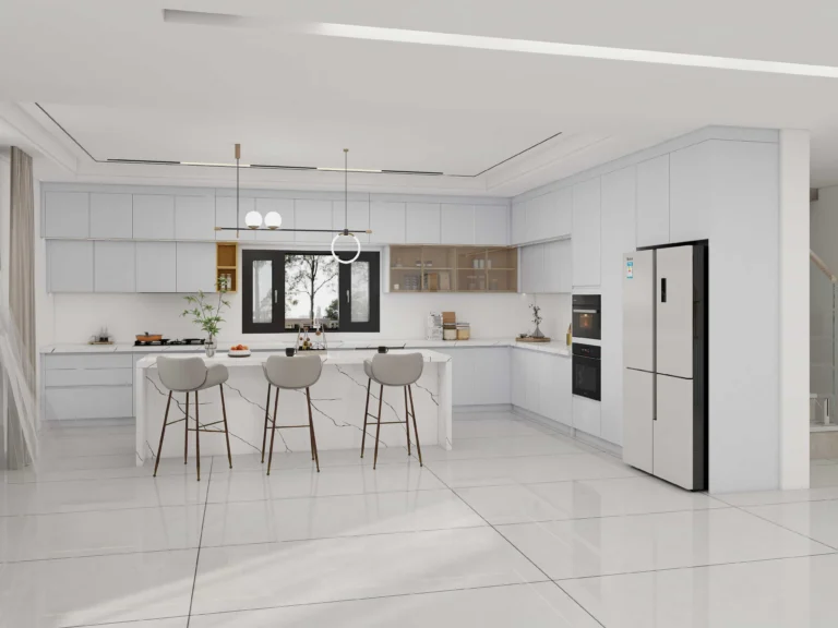 A minimalist white kitchen cabinet with hidden handles and clean flat panels in a bright modern home.