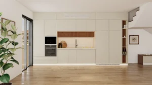 Cream cabinets with dark wood accents offer a luxurious, balanced contrast in the kitchen.